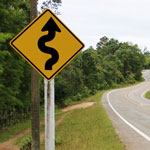 winding road sign