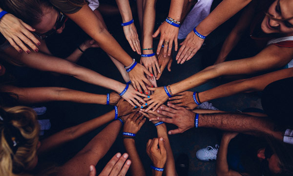 many hands together